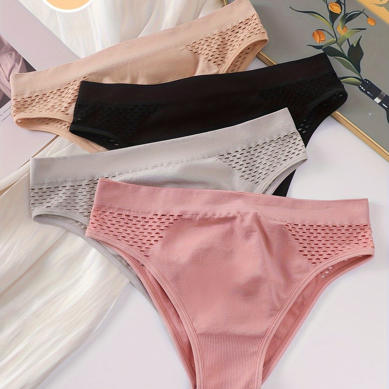 Set of 4 Mixed Color Low-Rise Women'S Underwear with a Hollow Design, Sporty Style, Seamless, Suitable for And, Featuring a Unique Triangle Cut.