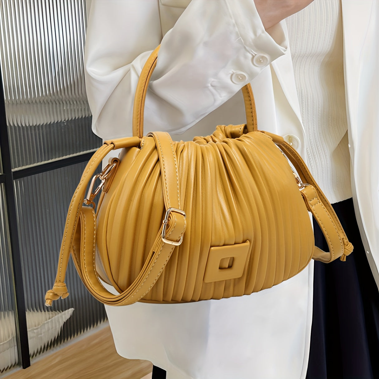 The Terilte Women'S Drawstring Bucket Bag Is a Pleated Handbag That Can Also Be Used As a Crossbody Bag. It Features a Detachable Shoulder Strap, Allowing for Easy Transitions Between a Handbag, Shoulder Bag, And Crossbody Ba
