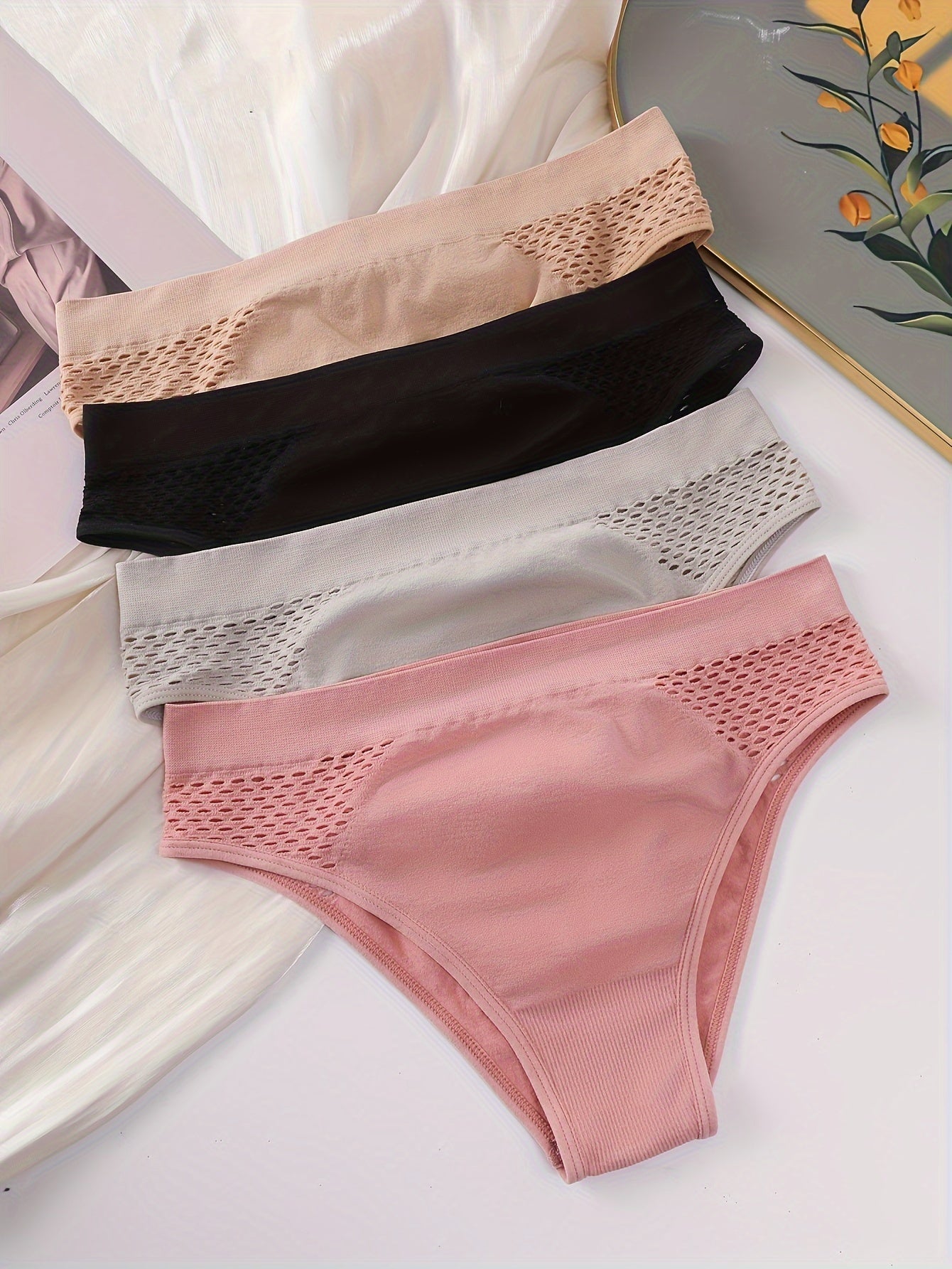 Set of 4 Mixed Color Low-Rise Women'S Underwear with a Hollow Design, Sporty Style, Seamless, Suitable for And, Featuring a Unique Triangle Cut.